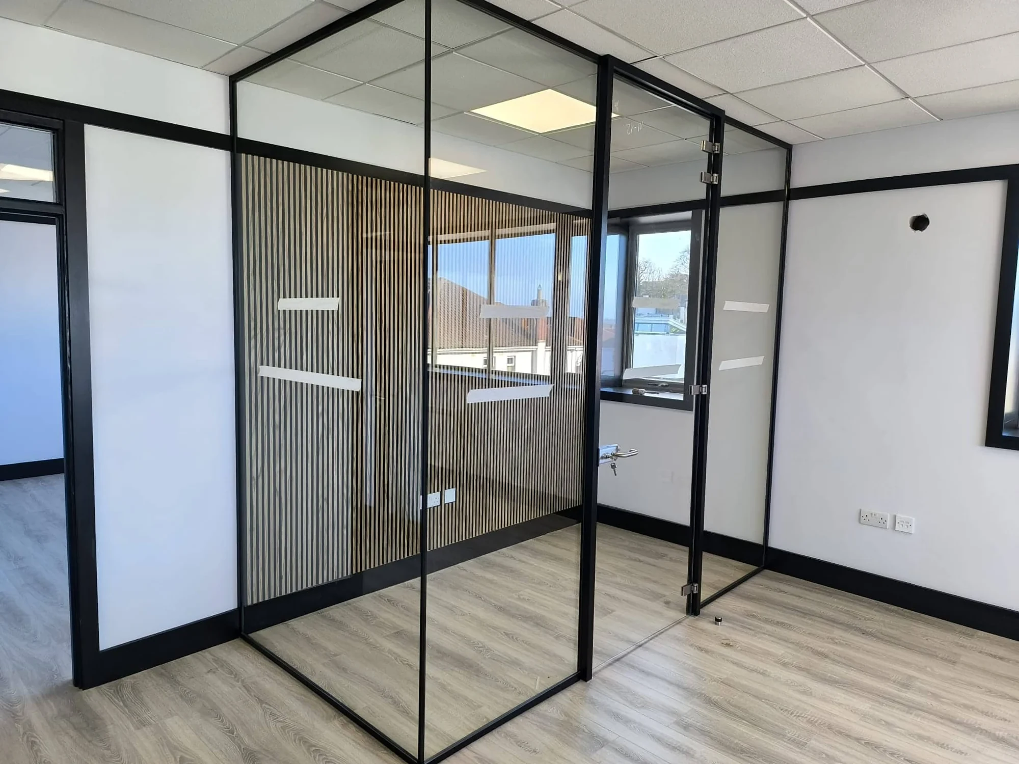 Black framed architectural glass partitions in Ranelagh